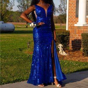 Blue sequin body con prom dress with slit down the side